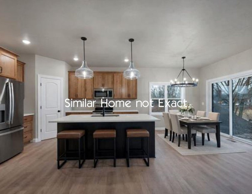 Enjoy an open-concept great room that flows effortlessly into - photo 2
