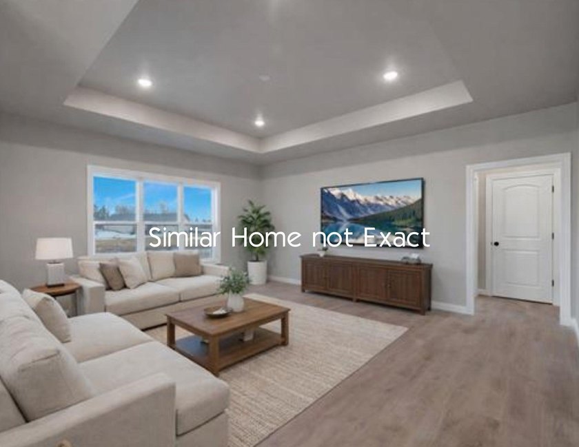 Enjoy an open-concept great room that flows effortlessly into - photo 3