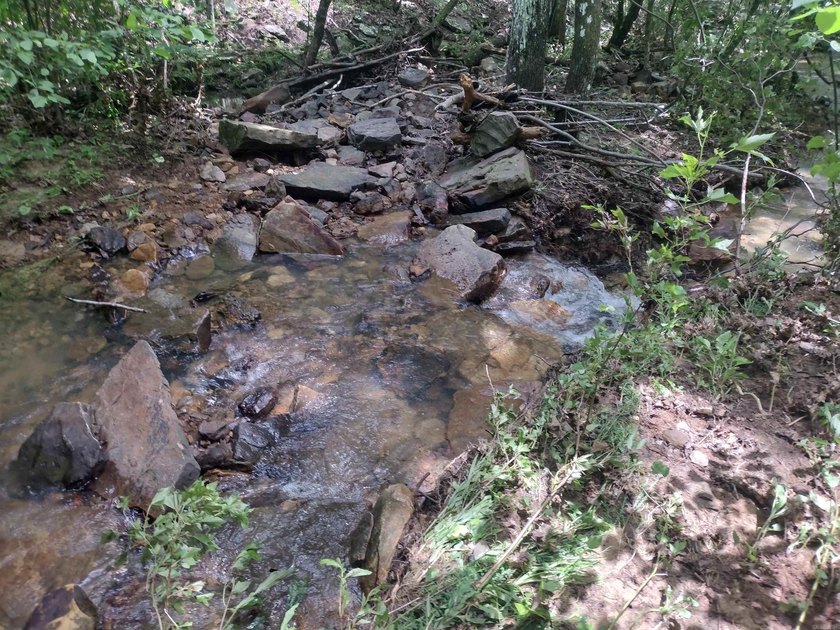 This stunning property near Greers Ferry Lake boast small creek - photo 3