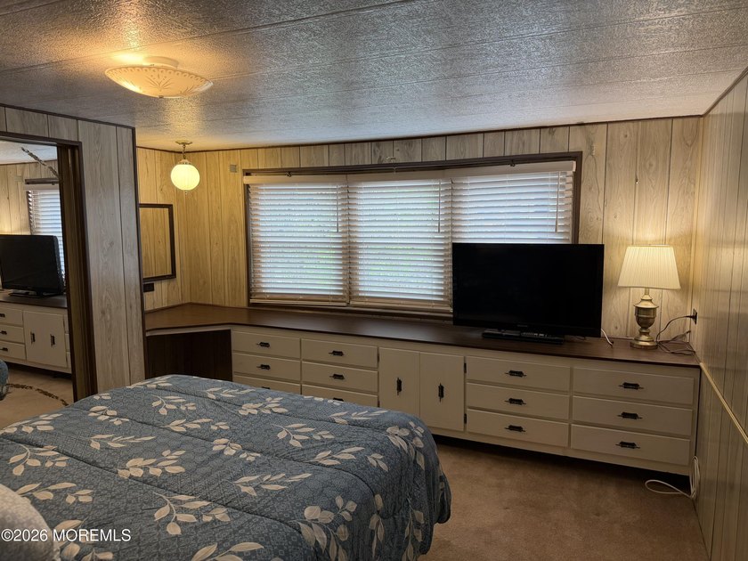 Quiet serenity is what you will find at this home, snuggled up - photo 23