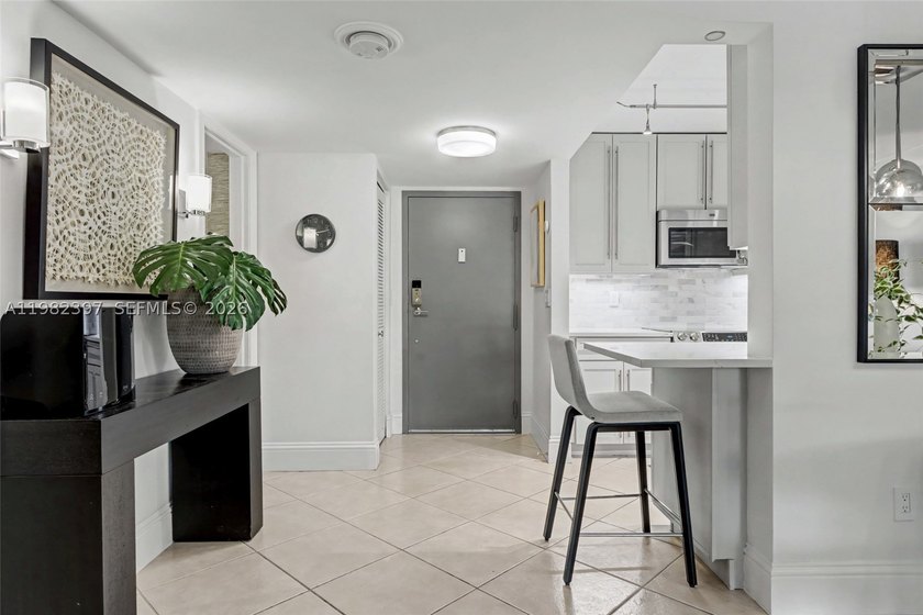 Explore a beautifully renovated first-floor condo with garage - photo 11