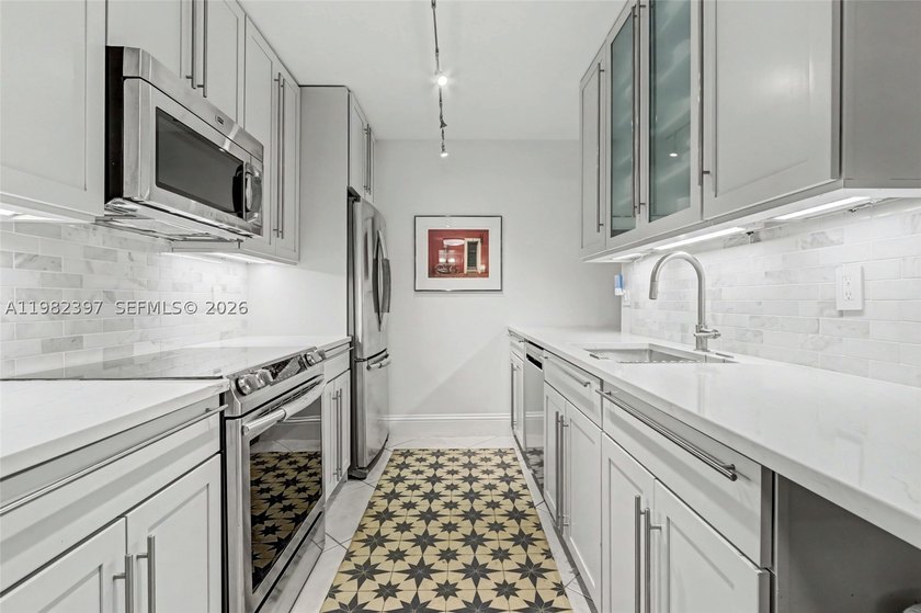 Explore a beautifully renovated first-floor condo with garage - photo 16