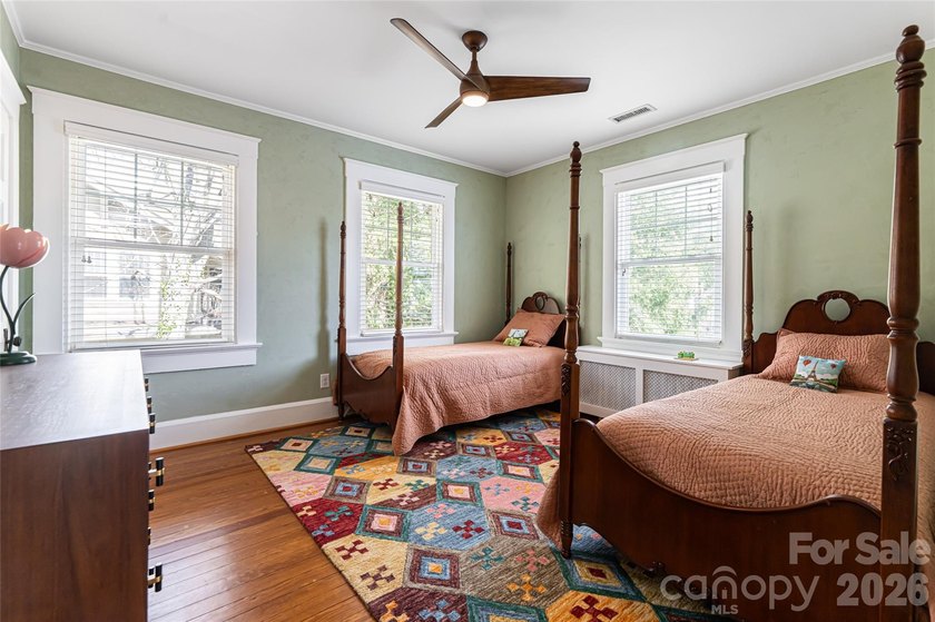 There is a warm, inviting grace to this Grove Park home that - photo 12