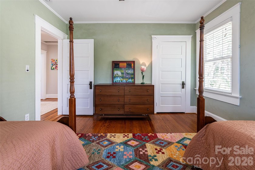 There is a warm, inviting grace to this Grove Park home that - photo 13