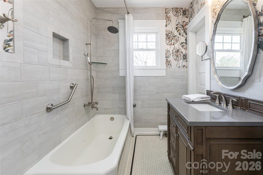 There is a warm, inviting grace to this Grove Park home that - photo 15