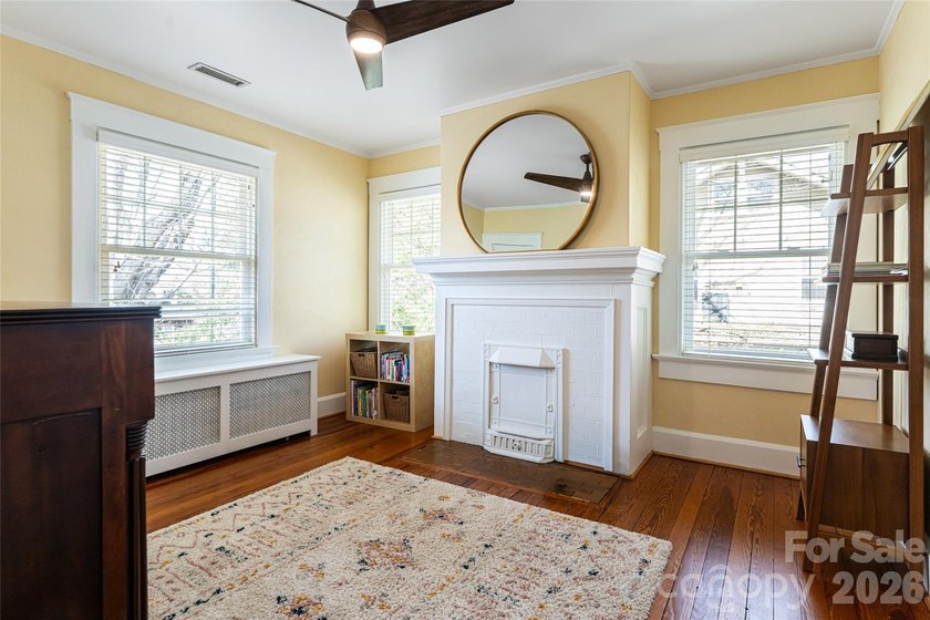 There is a warm, inviting grace to this Grove Park home that - photo 17