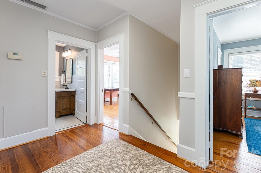 There is a warm, inviting grace to this Grove Park home that - photo 22