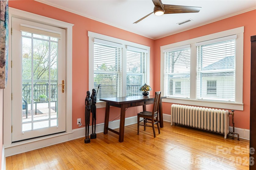 There is a warm, inviting grace to this Grove Park home that - photo 23
