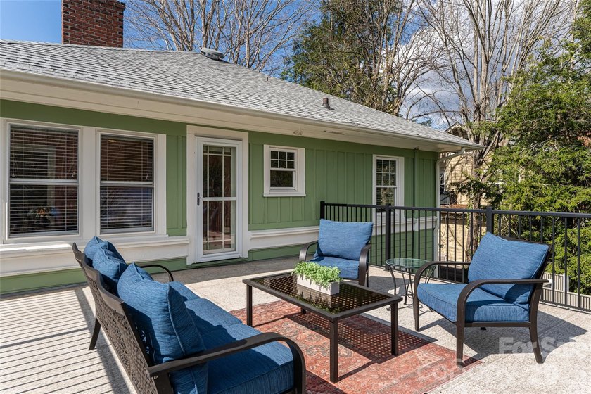 There is a warm, inviting grace to this Grove Park home that - photo 26