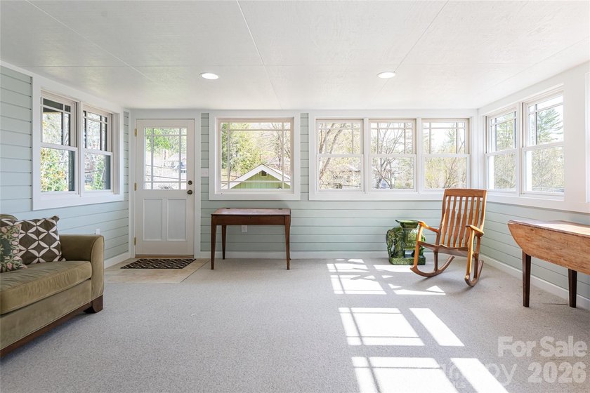There is a warm, inviting grace to this Grove Park home that - photo 30