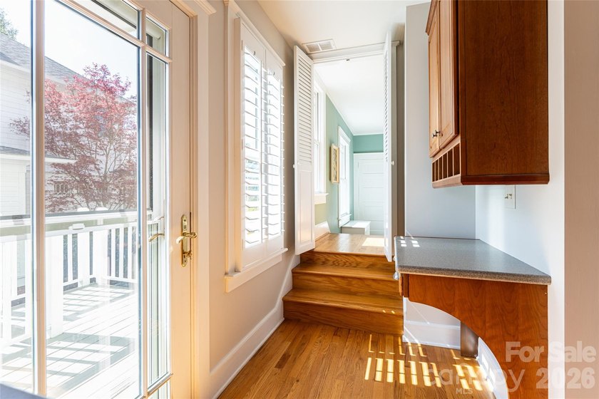 There is a warm, inviting grace to this Grove Park home that - photo 41