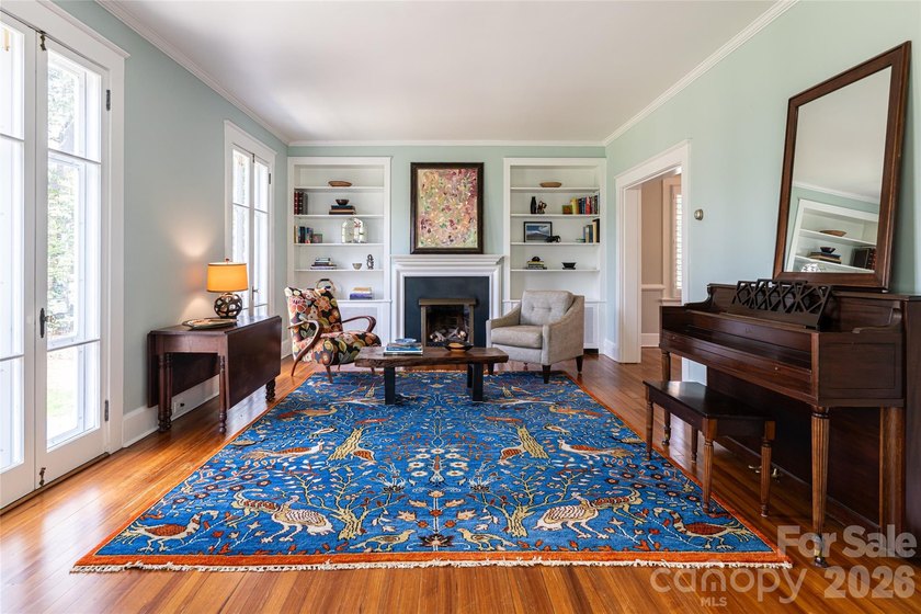 There is a warm, inviting grace to this Grove Park home that - photo 42