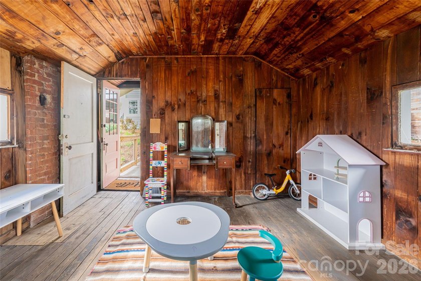 There is a warm, inviting grace to this Grove Park home that - photo 45