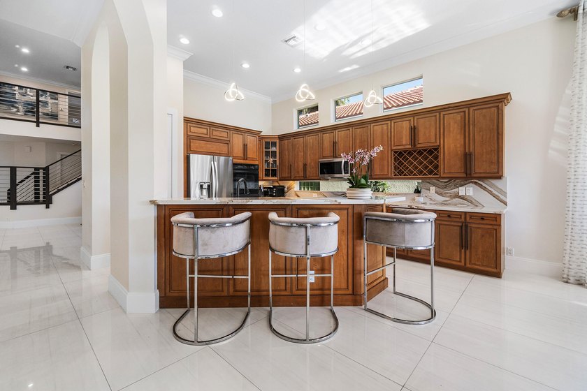 Nestled within one of South Florida's most coveted addresses - photo 9