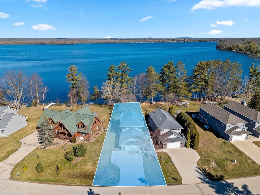 Condo MLS #50324036. Level lot with sandy frontage on popular - photo 2