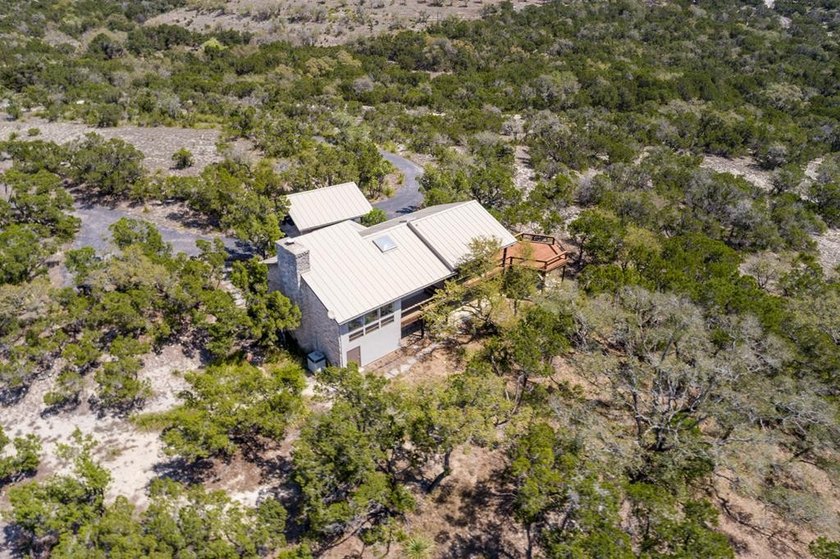 Beautiful hill country home on 59+/- acres!!! This amazing - photo 8