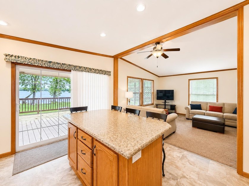 Experience lake life at its finest with this fully furnished 3 - photo 3