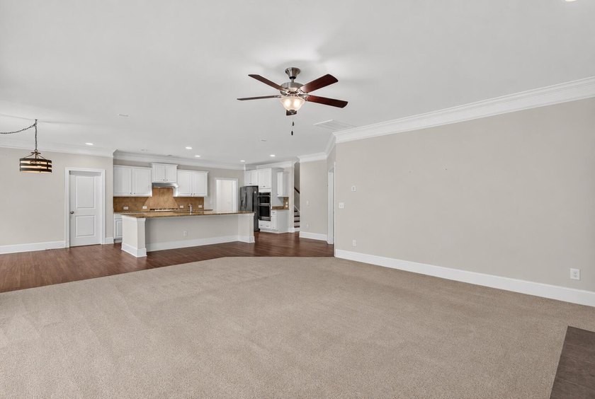 Situated on a generously sized golf course lot in Mount Vintage - photo 3