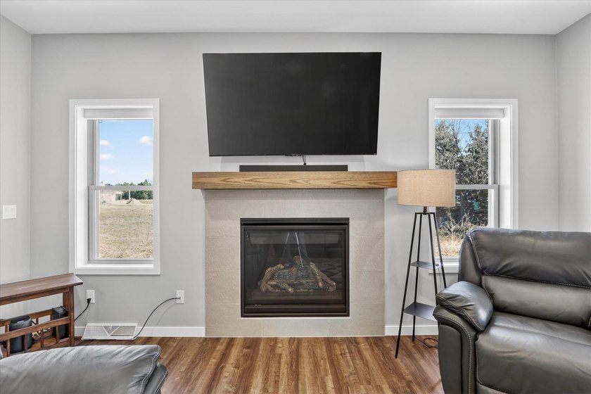 Welcome home to this beautifully designed 2025-built condo - photo 9