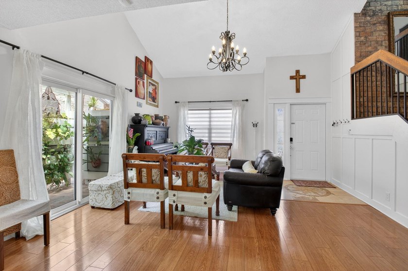 This charming home boasts hardwood floors throughout, granite - photo 4