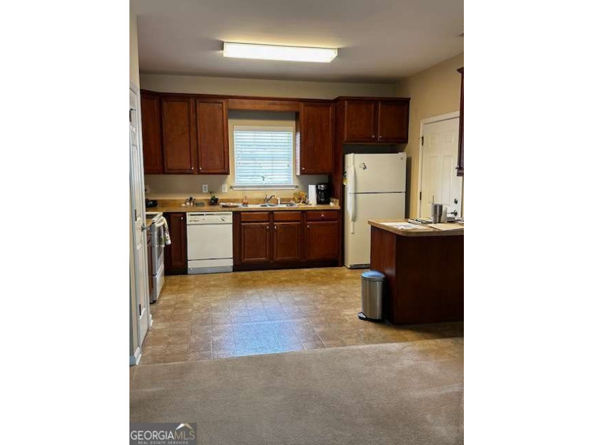 Welcome home to this charming 2-bedroom, 2-bath, all brick condo - photo 6