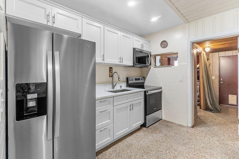 Welcome to this charming single-story residence This - photo 16