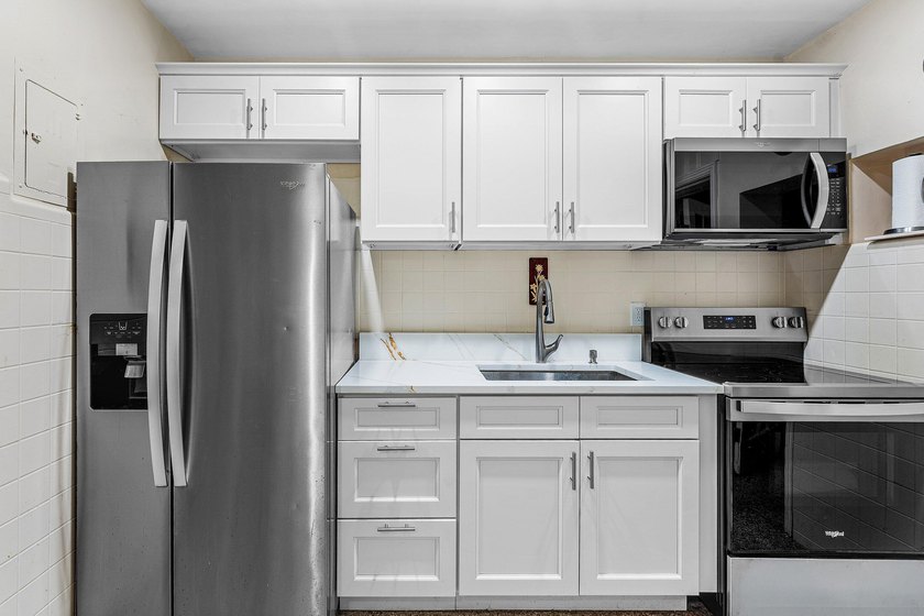 Welcome to this charming single-story residence This - photo 19