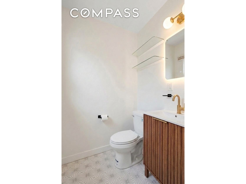 Welcome to this RENOVATED solid brick townhouse offering space - photo 8