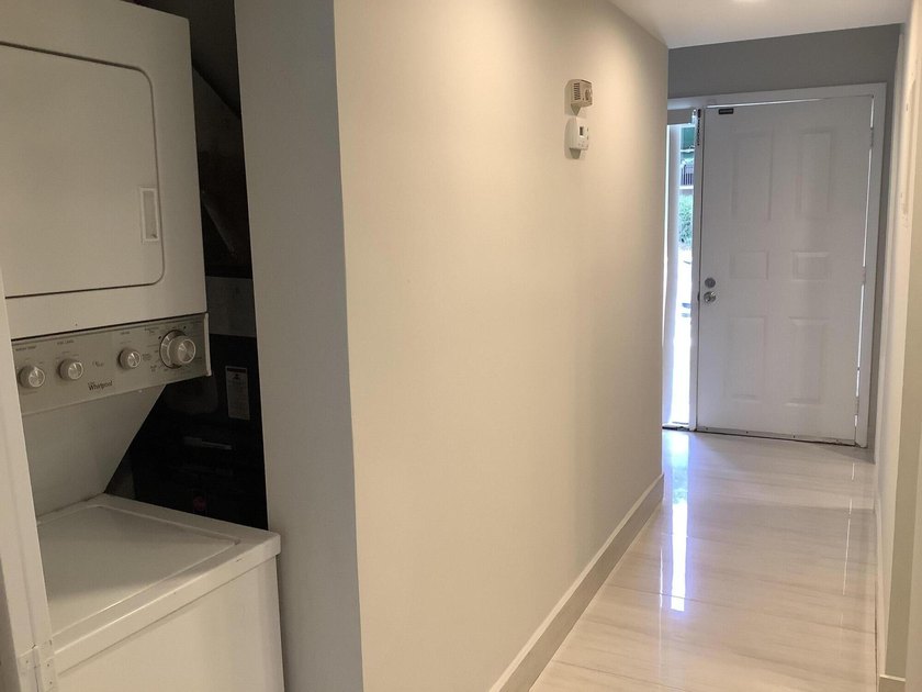 This beautifully renovated 2-bedroom, 2-bathroom townhouse is - photo 5