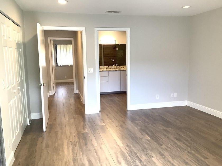 This beautifully renovated 2-bedroom, 2-bathroom townhouse is - photo 9