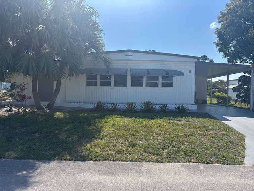 SPACIOUS HOME, VERY WELL MAINTAINED WITH 2 BEDROOMS, 2 BATHS AND - photo 3