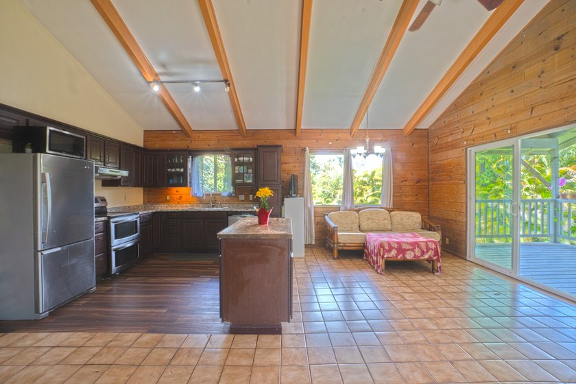 Nestled at the top of a knoll on an acre of land this two-story - photo 3