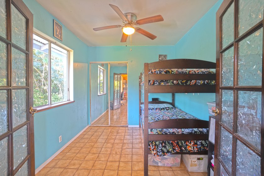 Nestled at the top of a knoll on an acre of land this two-story - photo 8