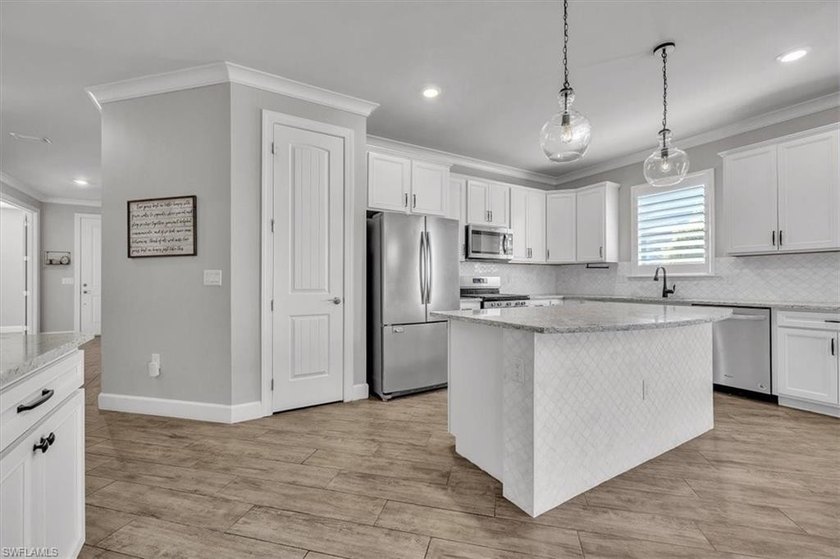 Move-in-ready and beautifully upgraded, this 3-bed + den, 2-bath - photo 10