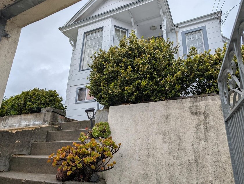 This spacious two-story home offers a versatile layout and - photo 2