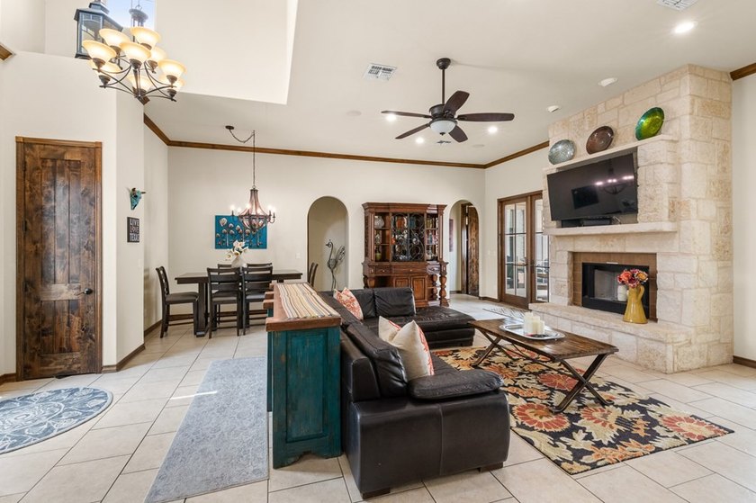 Experience refined Hill Country living in this stunning - photo 3