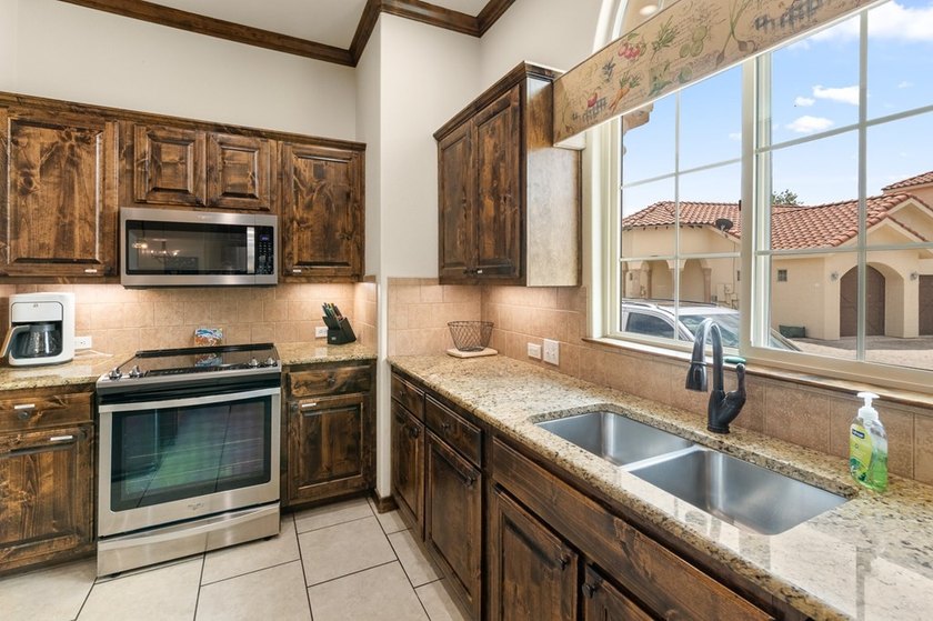 Experience refined Hill Country living in this stunning - photo 6