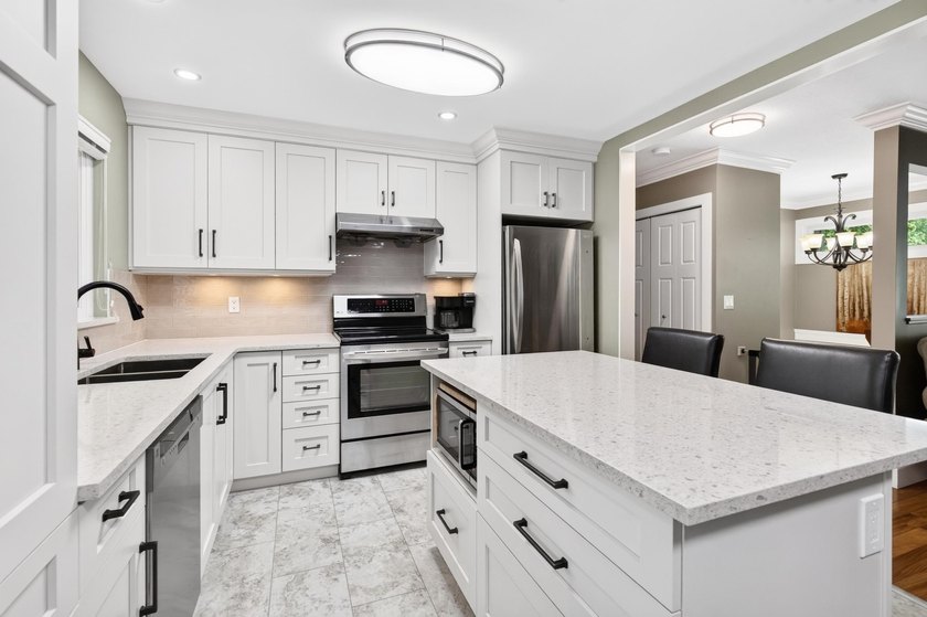 Welcome to this beautifully renovated 4-bedroom home, perfectly - photo 11