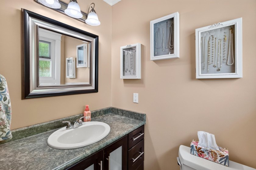Welcome to this beautifully renovated 4-bedroom home, perfectly - photo 16