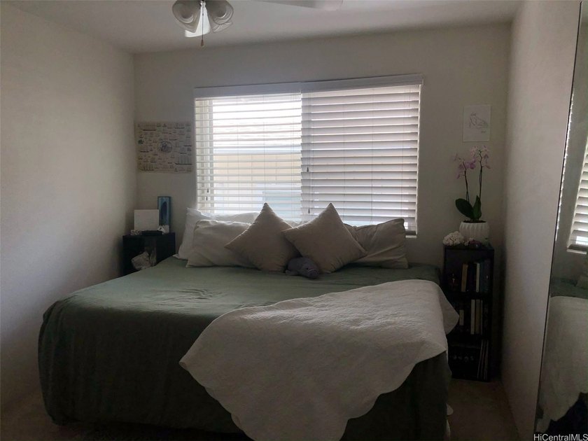 This 4 bedroom exudes the peaceful and serene energy of the - photo 5