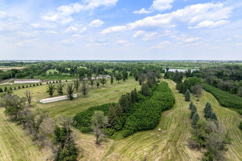 This expansive 30+ acre property offers a versatile canvas for - photo 47