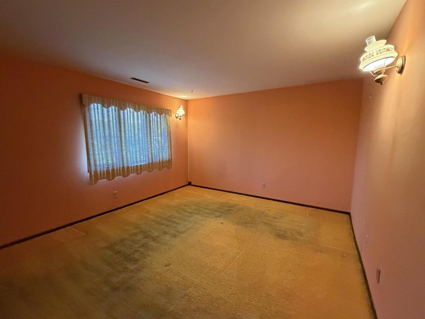 Opportunity awaits with this spacious two-story lakefront home - photo 15