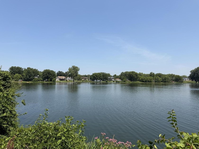 Opportunity awaits with this spacious two-story lakefront home - photo 31