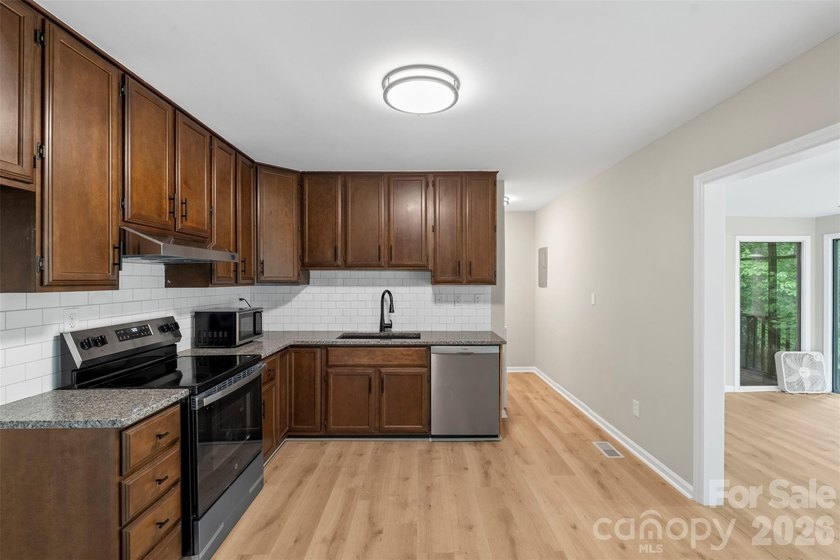 Welcome home to this recently renovated 4-bedroom property - photo 12