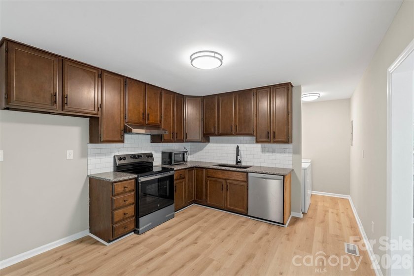 Welcome home to this recently renovated 4-bedroom property - photo 13