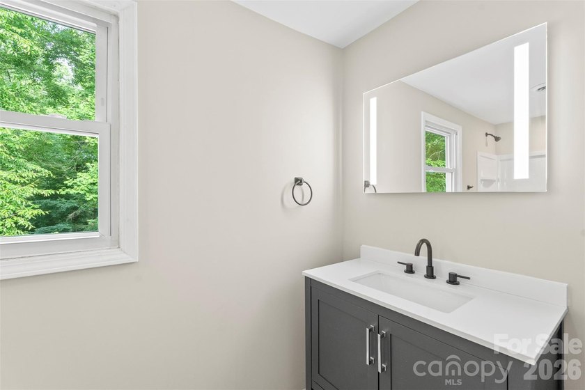 Welcome home to this recently renovated 4-bedroom property - photo 30