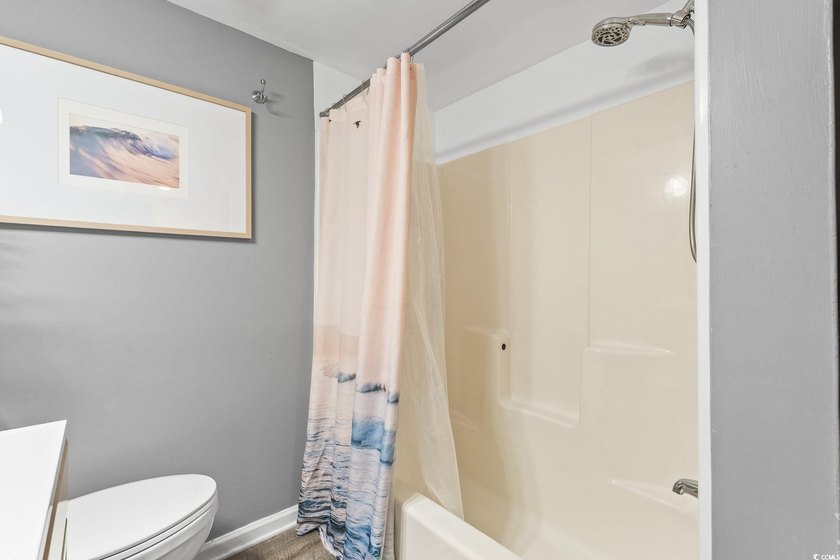 Discover your perfect beachside escape! This move-in ready - photo 7