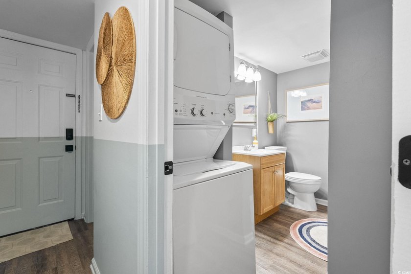 Discover your perfect beachside escape! This move-in ready - photo 8
