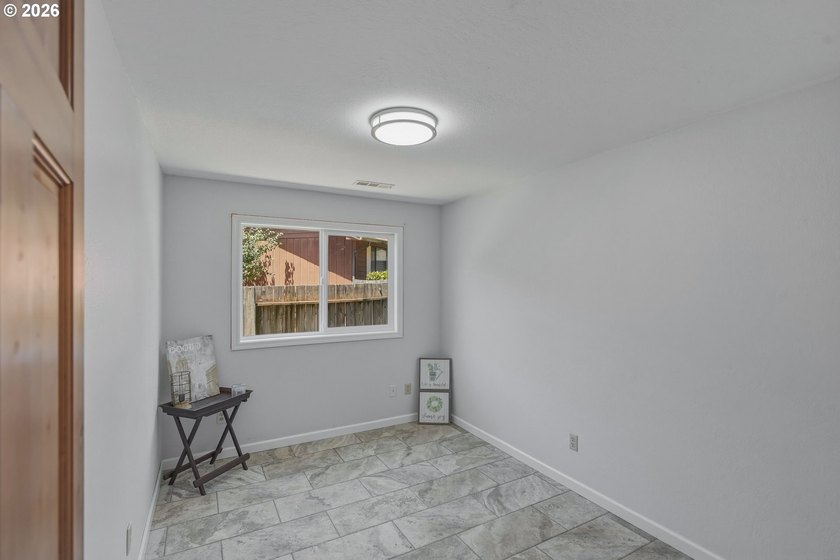 Beautifully updated and move-in ready, this 4-bedroom, 3-bath - photo 24