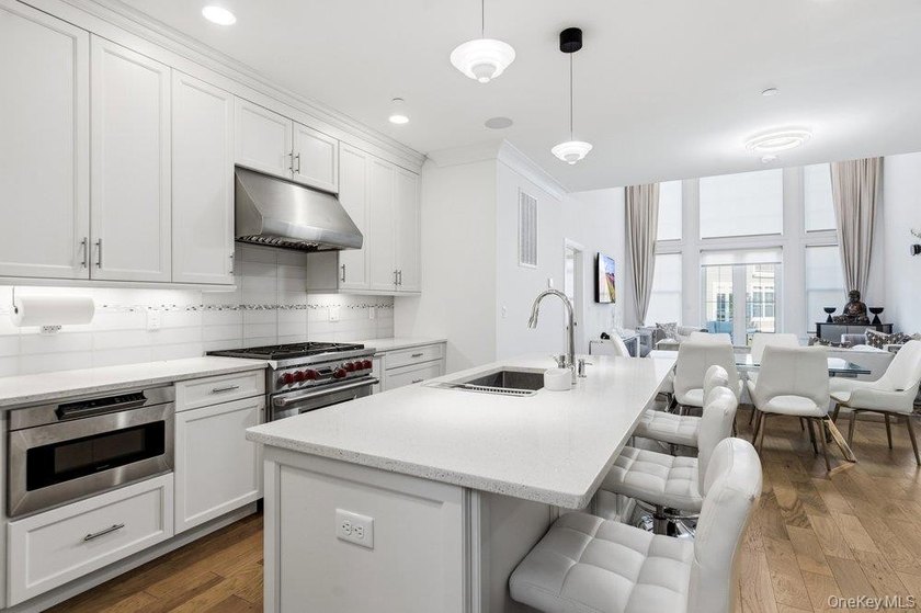 A Fabulous Jamestown Townhouse has a dramatic 2 Story Grand - photo 8